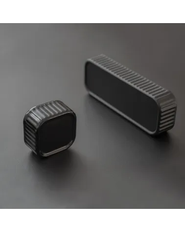 WEGA designer furniture handle presented on a dark background