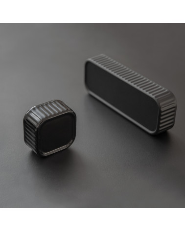 WEGA designer furniture handle presented on a dark background