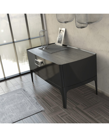 LAGO designer furniture handle in polished chrome mounted on a unit