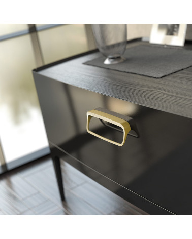 LAGO designer furniture handle in matt gold mounted on a unit