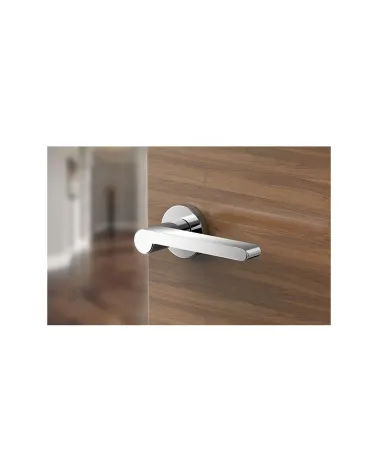Polished chrome Pandora door handle design handle front view fitted on a door