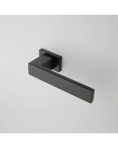PINA black door handle design angled top view fitted on a door