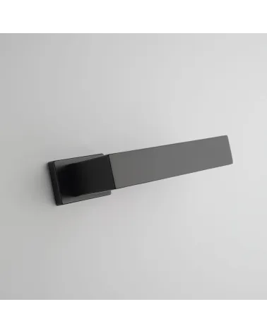 PINA black door handle designer handle angled bottom view mounted on a door
