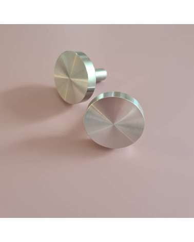 NENA M polished chrome furniture knob designer handle positioned side by side on a flat surface