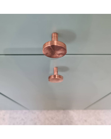 NENA M brass furniture knob designer handle top view mounted on a piece of furniture