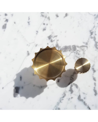 LEXI polished gold furniture knob designer handle top view lined horizontally on marble background