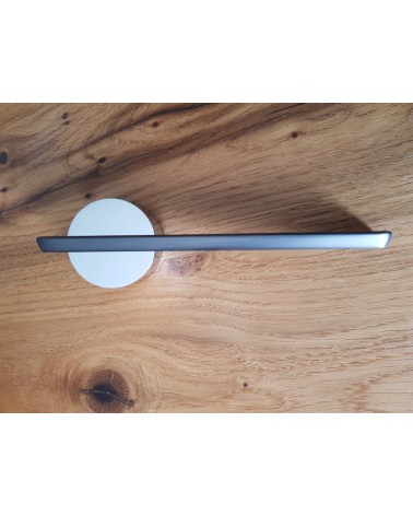 JUMELLE zamak door handle design handle front view placed on a plate