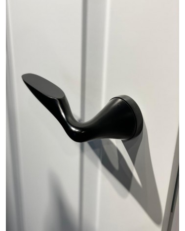 DOUCE zamak door handle design handle colour 1 angled top view mounted on a door