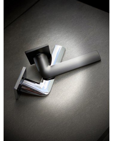 STINGER classic style door handle design handle with two colours fitted on a dark background
