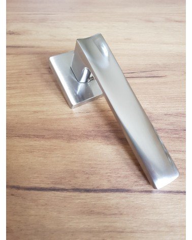 DIUNA aluminium door handle design handle placed on wood-patterned floor