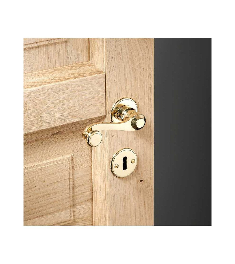 Brass crank door handle set on round rose