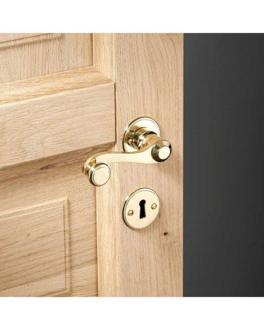 Brass crank door handle set on round rose