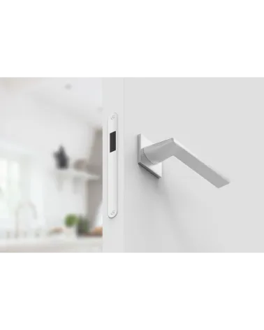 Satin chrome Harmony door handle design handle bottom view mounted on a door