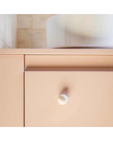 Grey beech wood furniture knob designer handle close-up front view mounted on a cabinet