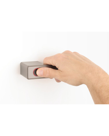 MAHONIA modern electronic door handle designer handle for right-handed held by a hand
