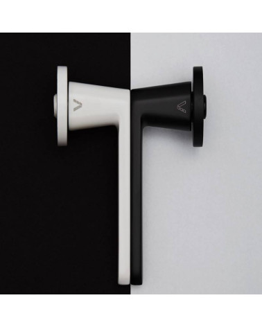 Nesh classic door handle designer ironmongery side view on a two-tone background