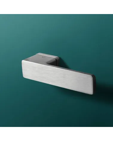 Zamak Cube door handle designer handle colour 1 mounted on a background