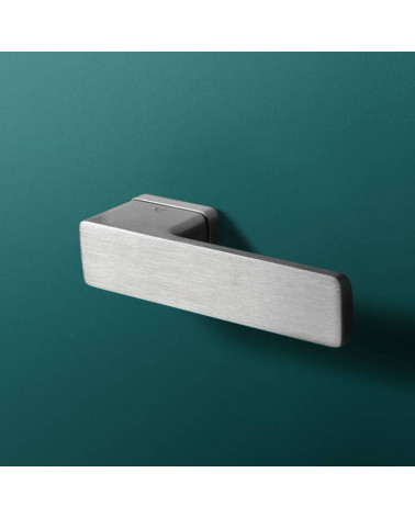 Zamak Cube door handle designer handle colour 1 mounted on a background