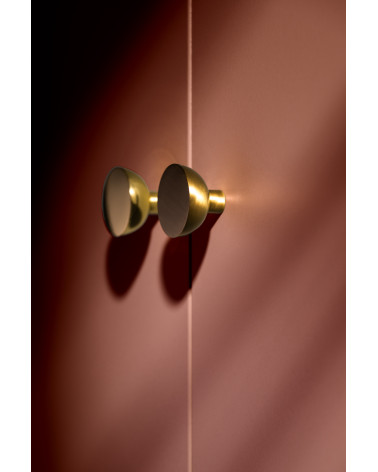 Matt gold LUNA M furniture knob, design handle, side view mounted on furniture