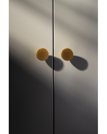 Matt gold LUNA M furniture knob, design handle, front view mounted on furniture