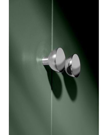Polished chrome LUNA M furniture knob, side view mounted on furniture