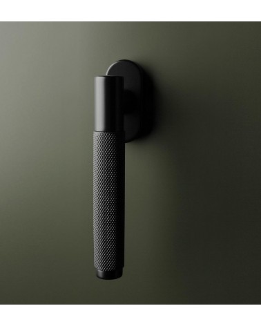 Black MOLINIA window handle design handle on dark background