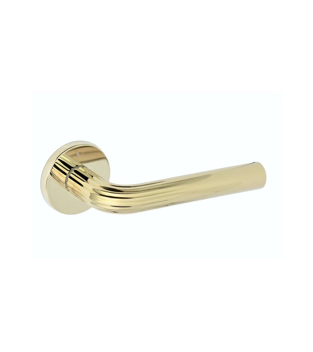 Polished brass Frella door handle designer handle