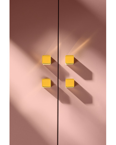 Brass ODETE furniture knob LANA S design handle front view with pronounced shadows cast downwards