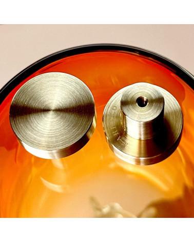 Brass furniture knob 01 design handle placed on an orange surface