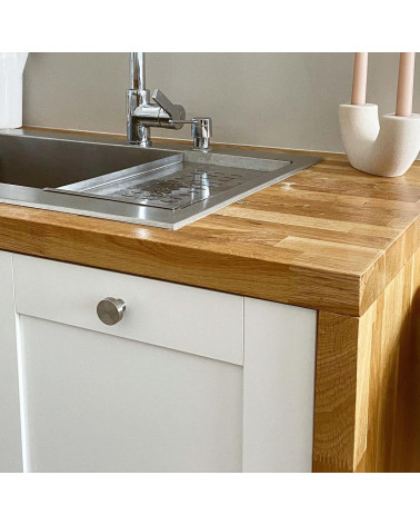 Stainless steel furniture knob model 01 design handle angled view on kitchen furniture