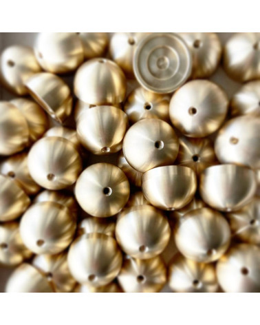 Brass furniture knob 02 design handle grouped in a pile on a flat surface