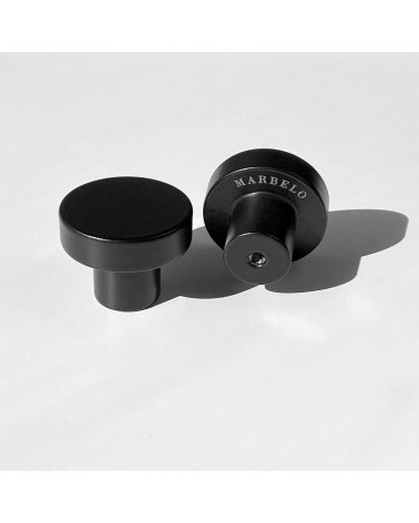 Black stainless steel furniture knob designer handle placed side by side on a background