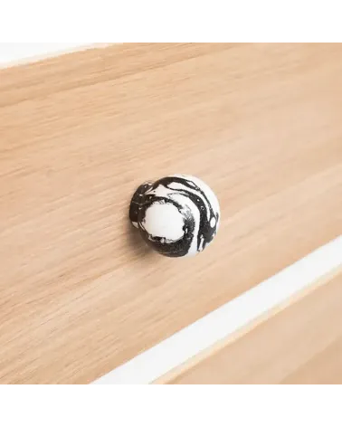 Black beech wood furniture knob designer handle side view on a wooden board