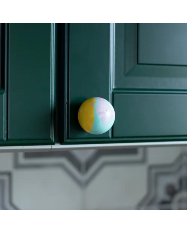 Funky yellow beech wood furniture knob designer handle close-up view installed on furniture