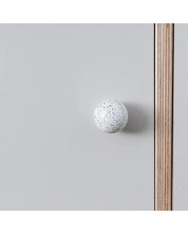 Beech wood furniture knob white/black Mix design handle front view mounted on a piece of furniture