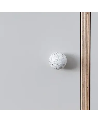 Beech wood furniture knob white/black Mix design handle front view mounted on a piece of furniture