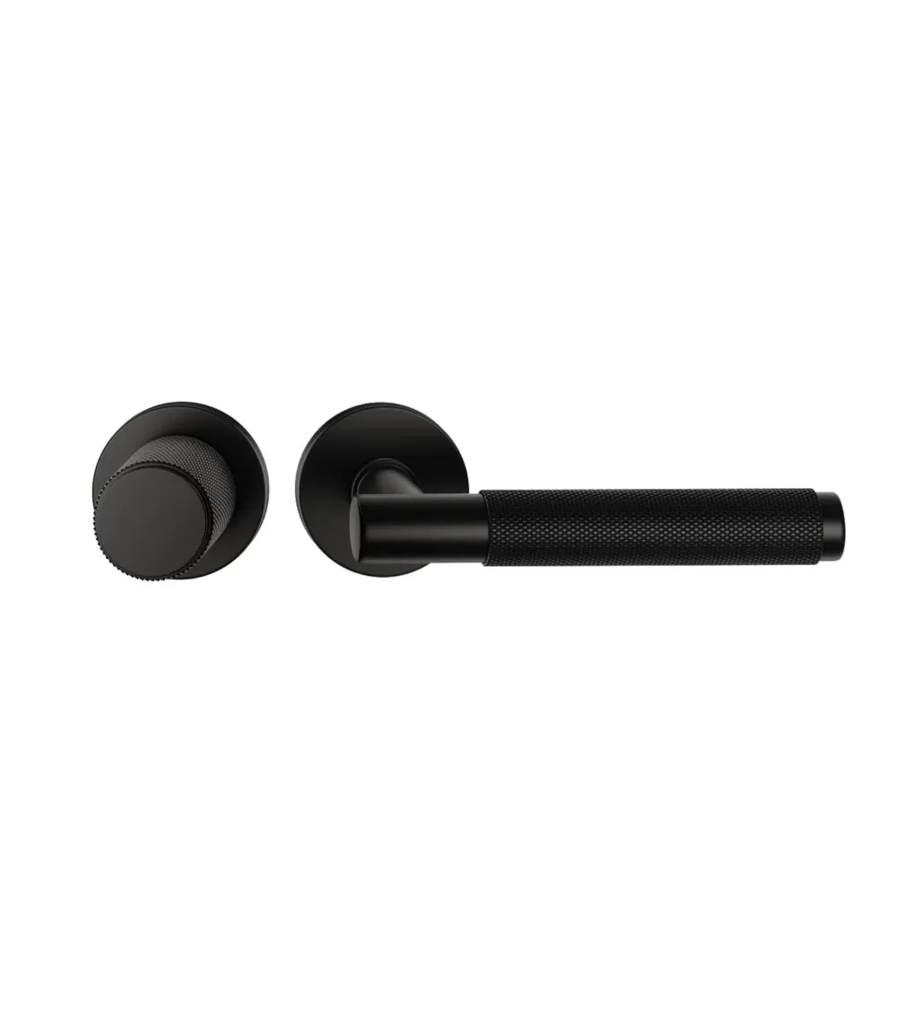 Asymmetric duo textured black Time designer door handle and knob aligned horizontally