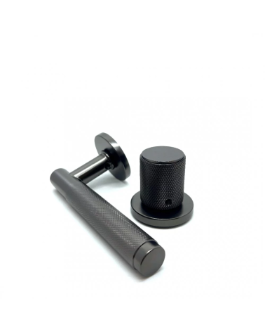Asymmetric duo textured graphite Time designer door handle and knob presented side by side