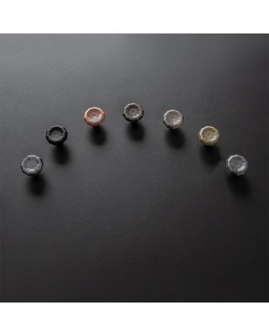 CAMPANA designer furniture knob handles arranged in an arc on a black surface