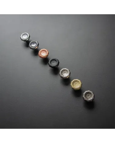 CAMPANA designer furniture knob handles aligned on a black surface