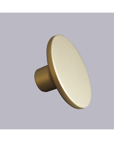 ASTRO matt gold furniture knob design handle on grey background