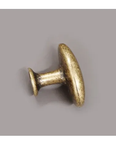 NAPOLI patinated brass furniture knob designer handle side view on light grey background