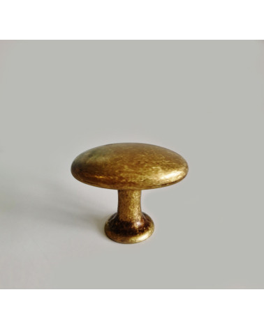NAPOLI patinated brass furniture knob designer handle front view on light grey background
