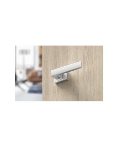 Satin chrome Focus designer door handle bottom view mounted on a door
