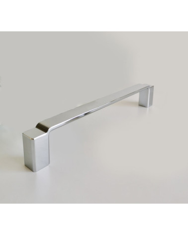 Polished chrome AMARO furniture handle design handle presented on a grey background