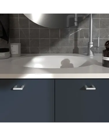 NOX satin chrome furniture handle designer handle mounted on a bathroom unit
