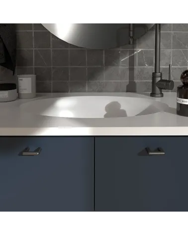 Titanium NOX furniture handle design handle fitted on a bathroom cabinet