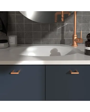 Copper NOX furniture handle design handle fitted on a bathroom cabinet