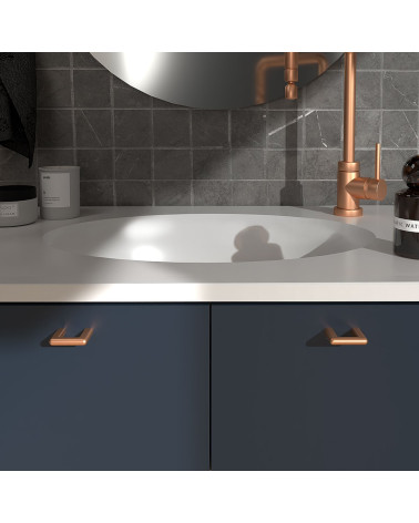 Copper NOX furniture handle design handle fitted on a bathroom cabinet