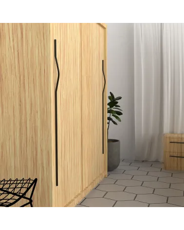 Matt black APRO-2 furniture handle designer handle mounted on a wardrobe